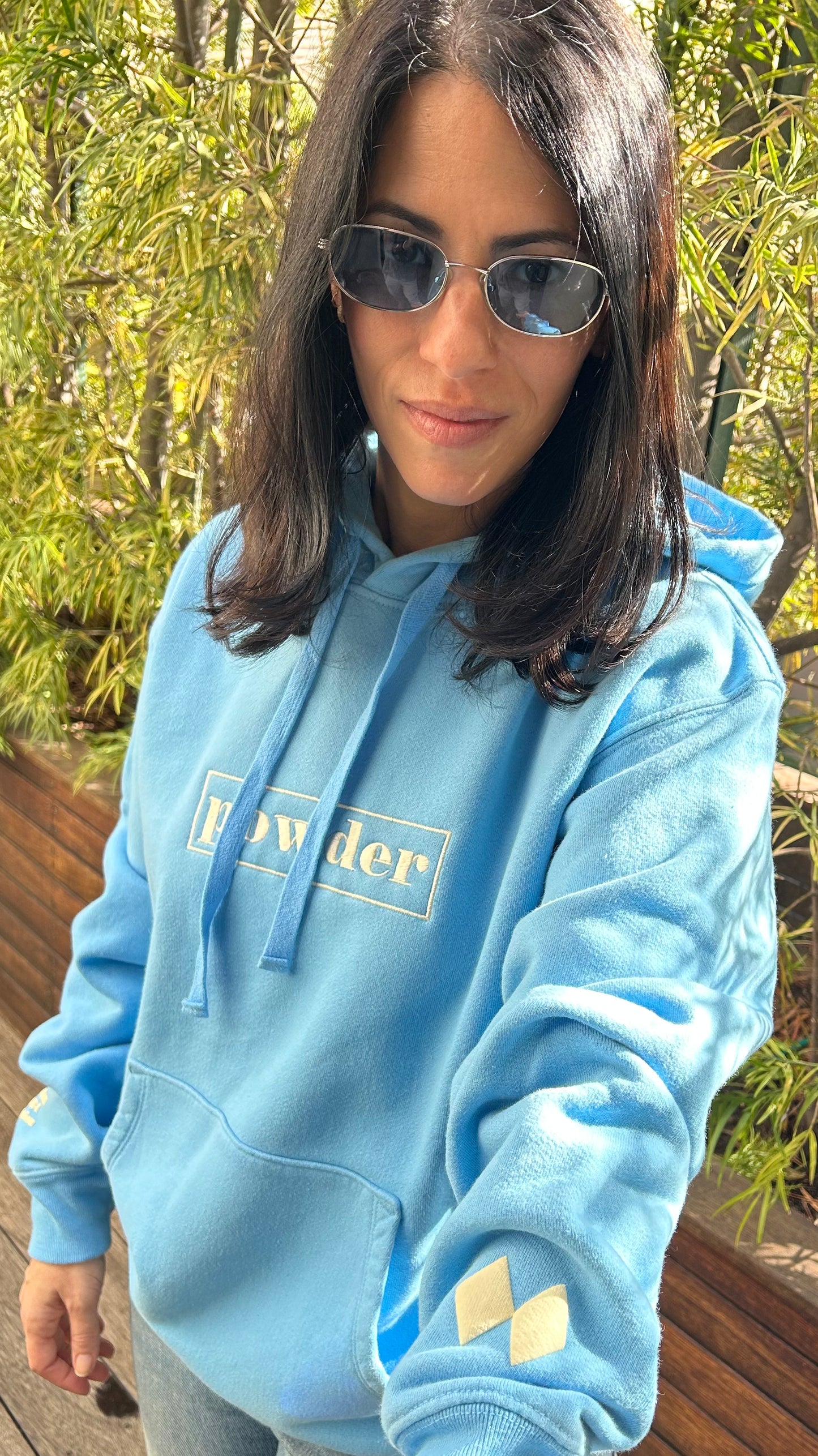 Model wearing Alaskan Blue Hoodie - Apres ski outfit