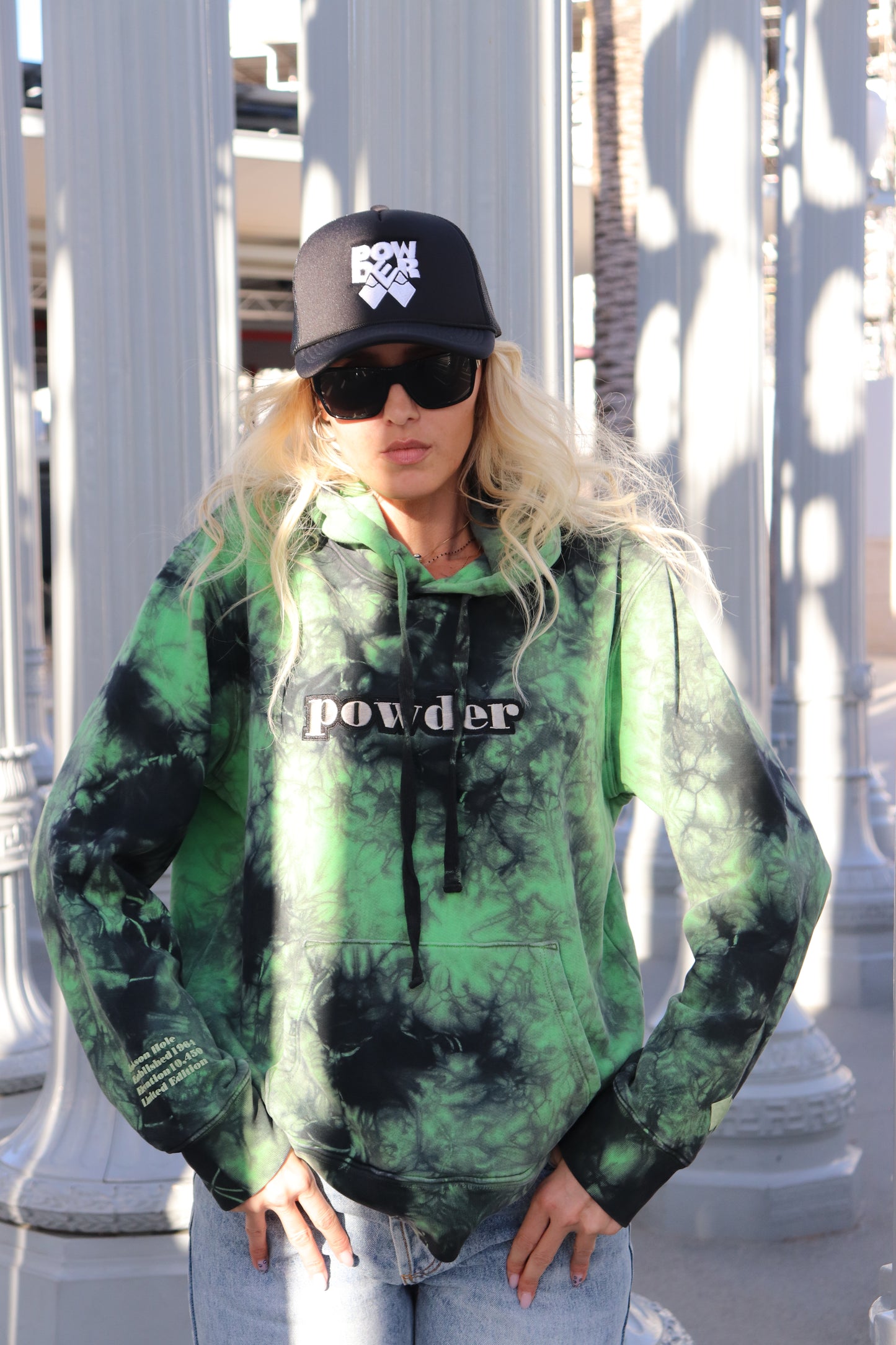 Model outside in a Tie Dye Green & Black PowderLA hoodie