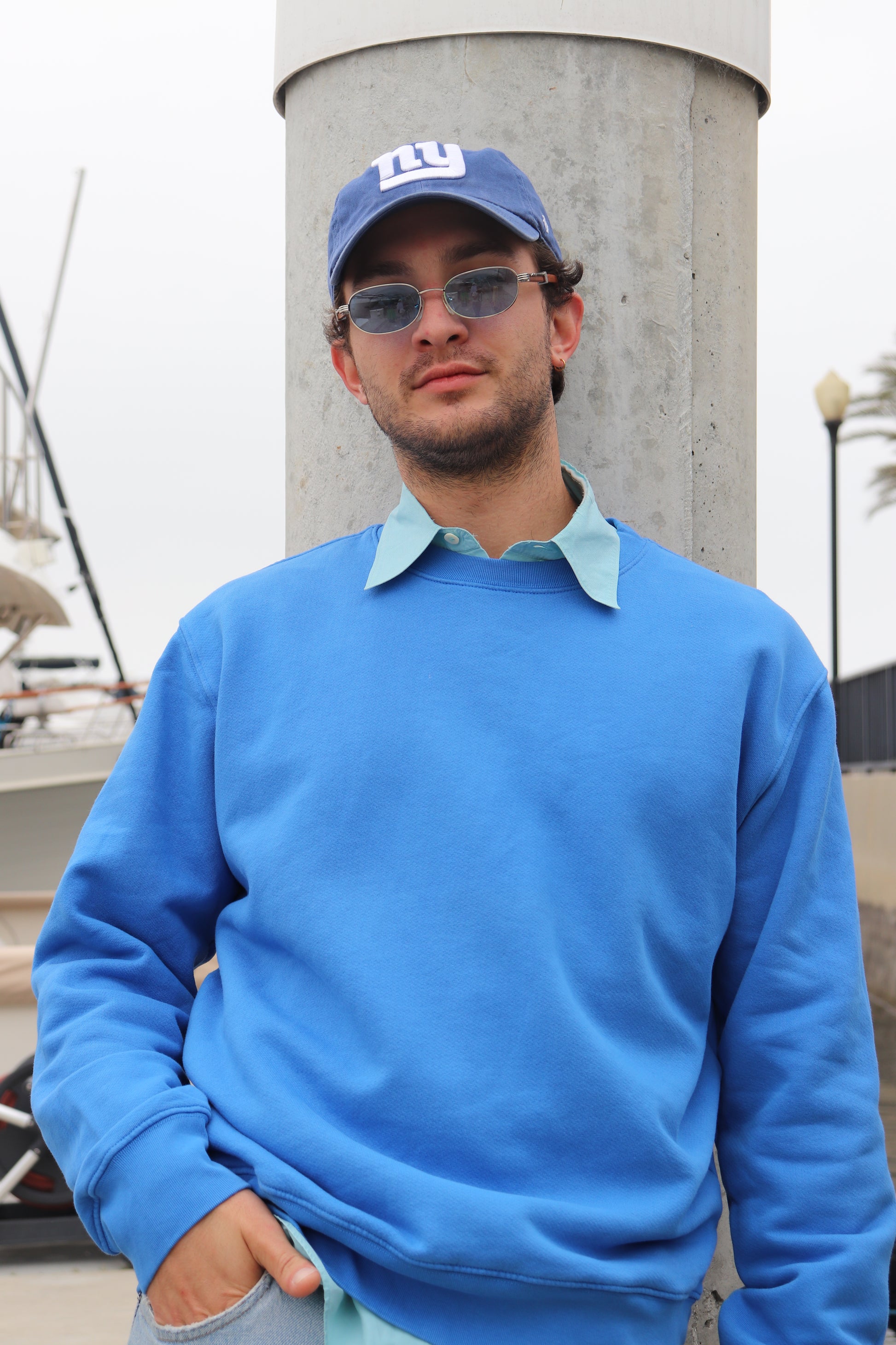 Street style look in ocean blue sweatshirt